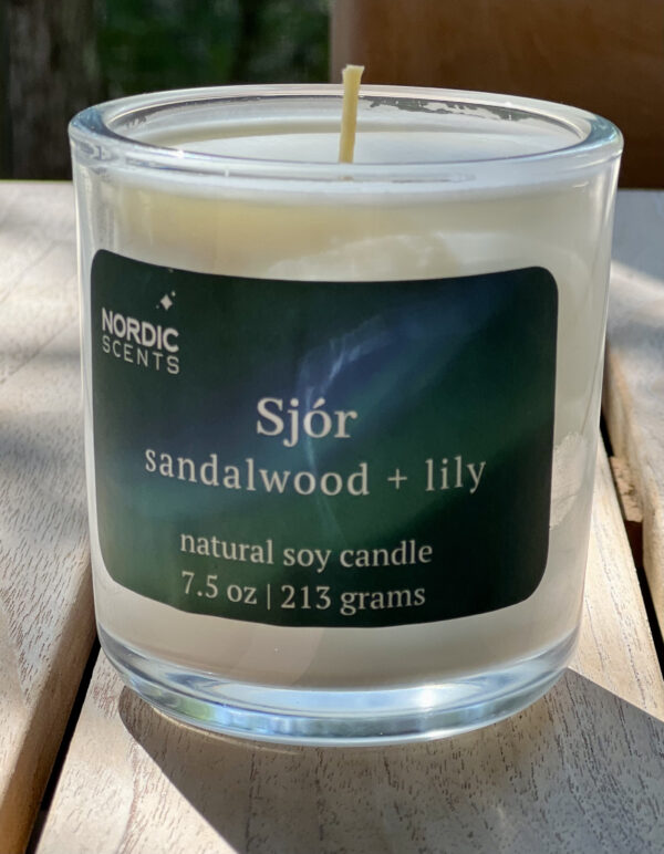 7.5 oz Sjór <br> sandalwood + lily + vanilla